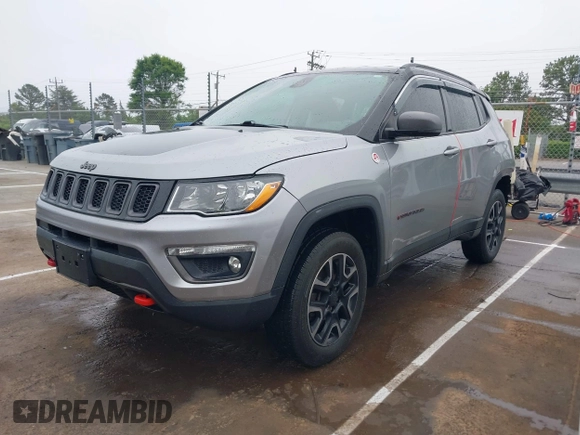 2019 Jeep Compass Trailhawk z VIN 3C4NJDDB9KT721767, wystawiony jako IAAI lot #42115252 z przebiegiem 78 607 mil mil oraz . Historia ofert i sprzedaży dostępna na DreamBid. Obrazek 18.