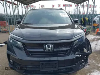 2022 Honda Pilot Special Edition with VIN 5FNYF6H2XNB059737, listed as a IAAI auction lot 41608678 with 50,273 mi miles and . Bid and sale history available at DreamBid. Image 12.