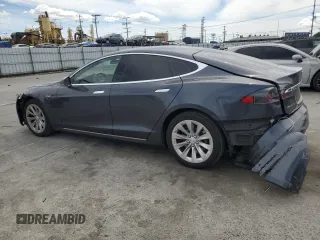 2016 Tesla Model S 70 with VIN 5YJSA1E1XGF149430, listed as a Copart auction lot 51339015 with 104,917 mi miles and Salvage title. Bid and sale history available at DreamBid. Image 2.