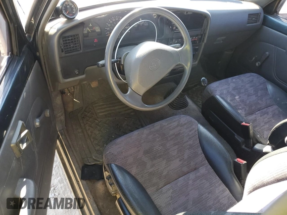 1994 Toyota Pickup z VIN 4TARN81A5RZ221208, wystawiony jako Copart lot #47466265 z przebiegiem 244 088 mil mil oraz Szkoda całkowita • Salvage title. Historia ofert i sprzedaży dostępna na DreamBid. Obrazek 8.