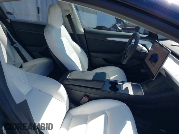2022 Tesla Model 3 with VIN 5YJ3E1EAXNF326354, listed as a IAAI auction lot 41651872 with 27,922 mi miles and . Bid and sale history available at DreamBid. Image 5.