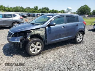 2012 Kia Sportage LX with VIN KNDPBCA2XC7240839, listed as a Copart auction lot 60024605 with 37,265 mi miles and Salvage title. Bid and sale history available at DreamBid. Image 1.