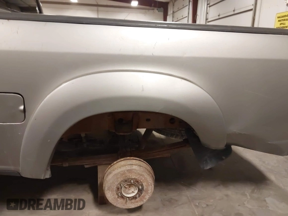 2004 Toyota Tundra SR5 with VIN 5TBDT44104S441271, listed as a IAAI auction lot 41823831 with 296,637 mi miles and . Bid and sale history available at DreamBid. Image 6.