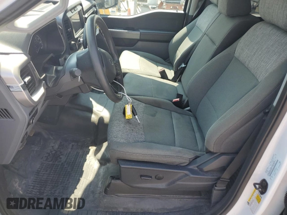 2023 Ford F-150 XL with VIN 1FTFW1EDXPFA77220, listed as a Copart auction lot 62571285 with 90,277 mi miles and Clean title. Bid and sale history available at DreamBid. Image 7.