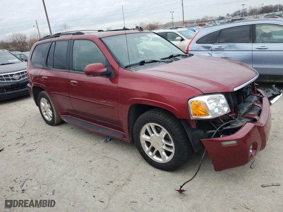 2007 GMC Envoy Denali with VIN 1GKET63MX72229013, listed as a Copart auction lot 84587704 with 103,318 mi miles and Salvage Title. Bid and sale history available at carsss.com. Image 4.