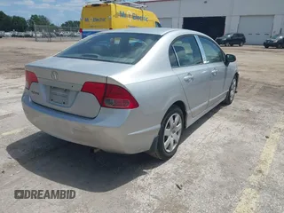 2008 Honda Civic LX with VIN 1HGFA16558L103040, listed as a IAAI auction lot 42170316 with 205,860 mi miles and . Bid and sale history available at DreamBid. Image 4.