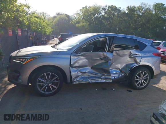 2020 Acura RDX Technology with VIN 5J8TC2H5XLL017439, listed as a IAAI auction lot 42243172 with 55,388 mi miles and . Bid and sale history available at DreamBid. Image 14.