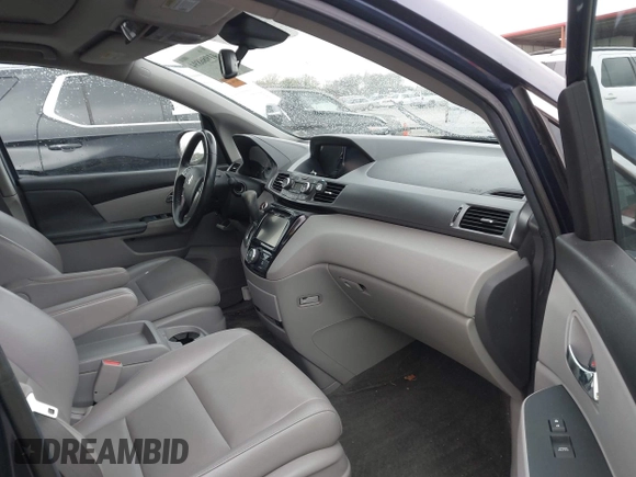 2014 Honda Odyssey EX-L with VIN 5FNRL5H68EB049914, listed as a IAAI auction lot 41986894 with 125,222 mi miles and . Bid and sale history available at carsss.com. Image 5.