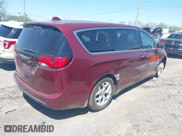 2020 Chrysler Pacifica Touring with VIN 2C4RC1FG5LR104163, listed as a IAAI auction lot 42018070 with 188,386 mi miles and . Bid and sale history available at DreamBid. Image 4.