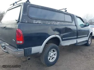 1998 Ford F-150 Standard with VIN 1FTZF18W0WNC16138, listed as a IAAI auction lot 41688951 with 354,669 mi miles. Bid and sale history available at carsss.com. Image 17.