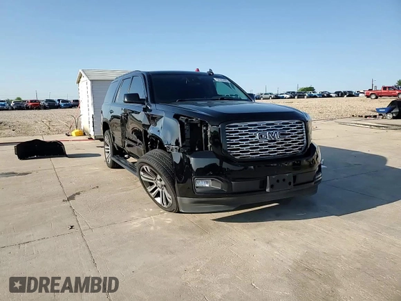2020 GMC Yukon Denali with VIN 1GKS2CKJ4LR144035, listed as a Copart auction lot 52163455 with 67,944 mi miles and Salvage Title. Bid and sale history available at carsss.com. Image 15.