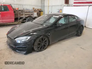 2021 Tesla Model S Plaid z VIN 5YJSA1E64MF443848, wystawiony jako Copart lot #48897875 z przebiegiem Nie podano mil oraz Szkoda całkowita • Salvage title. Historia ofert i sprzedaży dostępna na DreamBid. Obrazek 1.