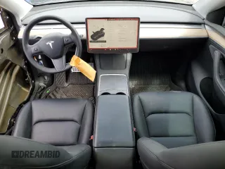2022 Tesla Model Y Long Range z VIN 7SAYGDEE7NA014402, wystawiony jako Copart lot #56325005 z przebiegiem 41 171 mil mil oraz Szkody całkowita. Historia ofert i sprzedaży dostępna na DreamBid. Obrazek 8.