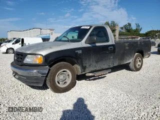 1999 Ford F-150 with VIN 1FTRF17W0XKB76972, listed as a Copart auction lot 41667295 with Not provided miles and Salvage title. Bid and sale history available at DreamBid. Image 1.