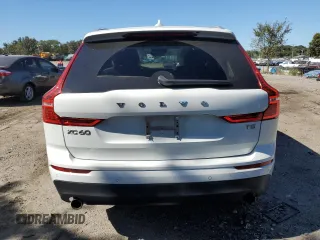 2020 Volvo XC60 Momentum z VIN YV4102DK5L1421574, wystawiony jako Copart lot #75533884 z przebiegiem 60 353 mil mil oraz Szkoda całkowita • Salvage title. Historia ofert i sprzedaży dostępna na DreamBid. Obrazek 6.