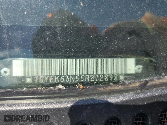 2005 Cadillac Escalade z VIN 1GYEK63N55R212898, wystawiony jako Copart lot #54323405 z przebiegiem Nie podano mil oraz Szkoda całkowita • Salvage title. Historia ofert i sprzedaży dostępna na DreamBid. Obrazek 13.