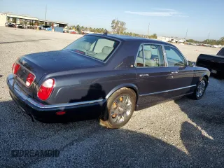 2005 Bentley Arnage R z VIN SCBLC37F65CX10805, wystawiony jako Copart lot #80332124 z przebiegiem Nie podano mil oraz Nie do naprawy. Historia ofert i sprzedaży dostępna na DreamBid. Obrazek 3.