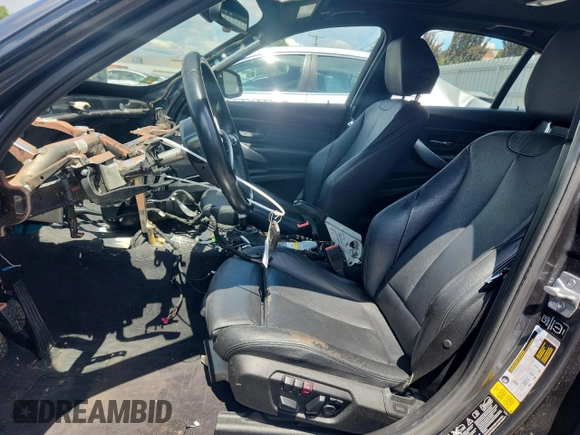 2014 BMW 3 Series 335i xDrive with VIN WBA3B9C58EJ466051, listed as a Copart auction lot 65060915 with Not provided miles and Salvage title. Bid and sale history available at DreamBid. Image 7.