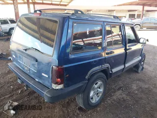 2001 Jeep Cherokee Sport с VIN 1J4FT48S01L581315, выставлен на аукционе IAAI как лот 40392021 с пробегом Не указан миль и . История ставок и продаж доступна на DreamBid. Изображение 4.