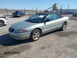 1999 Chrysler Sebring JXi z VIN 3C3EL55H6XT603058, wystawiony jako IAAI lot #41774322 z przebiegiem 157 852 mil mil oraz . Historia ofert i sprzedaży dostępna na DreamBid. Obrazek 2.