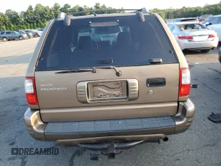 2001 Isuzu Rodeo S with VIN 4S2CK58W314334096, listed as a Copart auction lot 68262924 with 140,657 mi miles and Salvage Title. Bid and sale history available at DreamBid. Image 6.