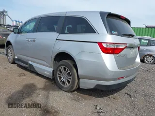 2011 Honda Odyssey EX-L with VIN 5FNRL5H61BB067456, listed as a IAAI auction lot 42131999 with 150,358 mi miles and . Bid and sale history available at carsss.com. Image 3.