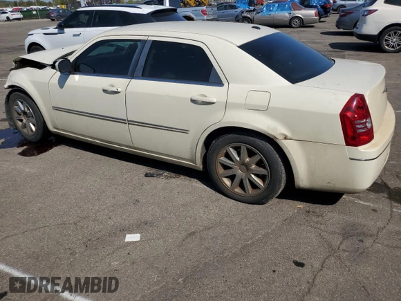 2009 Chrysler 300 Touring with VIN 2C3LA53V69H553621, listed as a Copart auction lot 70569634 with 141,157 mi miles and Salvage Title. Bid and sale history available at carsss.com. Image 2.