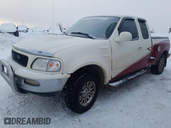 1998 Ford F-150 XL with VIN 2FTRX08L2WCA75995, listed as a Copart auction lot 43717305 with 301,987 mi miles and Salvage title. Bid and sale history available at DreamBid. Image 1.