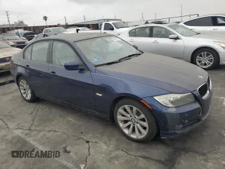 2011 BMW 3 Series 328i with VIN WBAPH5G50BNM82543, listed as a Copart auction lot 59016615 with 122,820 mi miles and Clean title. Bid and sale history available at DreamBid. Image 4.