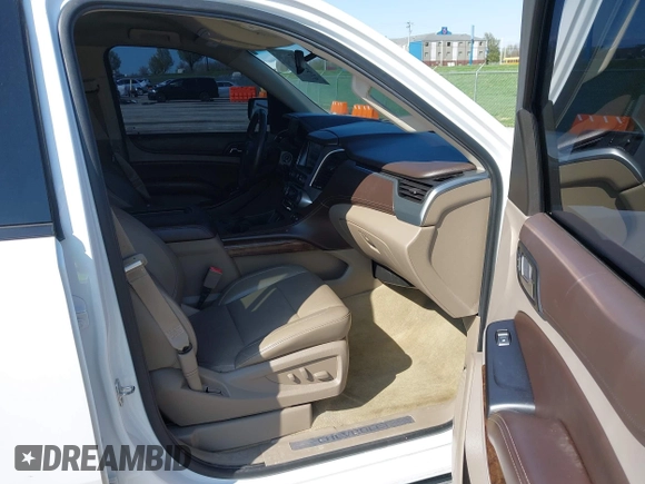 2015 Chevrolet Tahoe LT with VIN 1GNSCBKCXFR552071, listed as a IAAI auction lot 41972157 with 214,738 mi miles and . Bid and sale history available at DreamBid. Image 5.