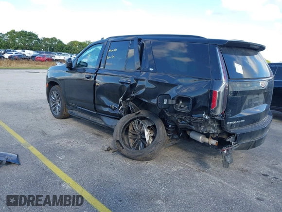 2023 Cadillac Escalade 4WD Sport z VIN 1GYS4EKL2PR351882, wystawiony jako IAAI lot #41555895 z przebiegiem 58 703 mil mil oraz . Historia ofert i sprzedaży dostępna na DreamBid. Obrazek 3.