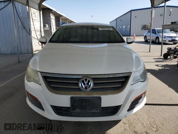 2011 Volkswagen CC Sport z VIN WVWMP7AN8BE721351, wystawiony jako Copart lot #59927035 z przebiegiem 140 724 mil mil oraz Czysty tytuł • Clean title. Historia ofert i sprzedaży dostępna na DreamBid. Obrazek 5.