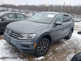 2020 Volkswagen Tiguan SE with VIN 3VV2B7AX7LM066135, listed as a IAAI auction lot 41349357 with 106,575 mi miles. Bid and sale history available at carsss.com. Image 2.