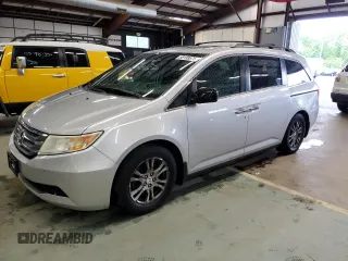 2013 Honda Odyssey EX-L z VIN 5FNRL5H63DB074203, wystawiony jako Copart lot #58199575 z przebiegiem 255 045 mil mil oraz Czysty tytuł • Clean title. Historia ofert i sprzedaży dostępna na DreamBid. Obrazek 1.