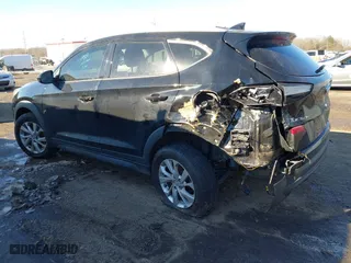 2019 Hyundai Tucson Value with VIN KM8J33A4XKU979791, listed as a IAAI auction lot 41255630 with 90,807 mi miles. Bid and sale history available at carsss.com. Image 3.