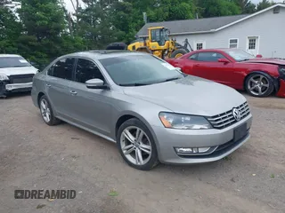 2014 Volkswagen Passat SE z VIN 1VWBN7A36EC045247, wystawiony jako IAAI lot #42295047 z przebiegiem 118 431 mil mil oraz . Historia ofert i sprzedaży dostępna na DreamBid. Obrazek 1.