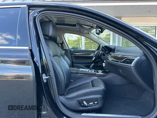 2022 BMW 7 Series 740i xDrive with VIN WBA7T4C06NCK78073, listed as a IAAI auction lot 42783922 with 104,432 mi miles and . Bid and sale history available at DreamBid. Image 5.