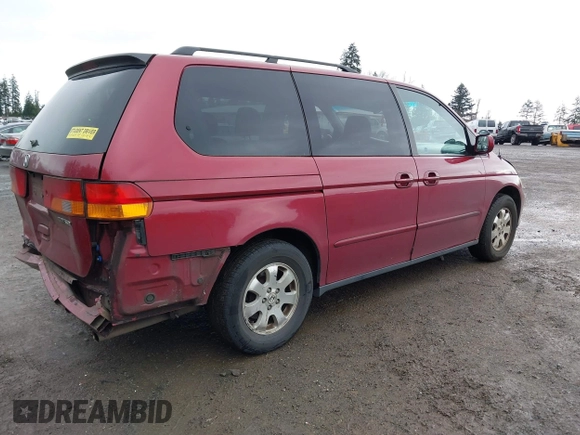 2003 Honda Odyssey EX z VIN 5FNRL18683B080893, wystawiony jako IAAI lot #41840931 z przebiegiem 218 794 mil mil oraz . Historia ofert i sprzedaży dostępna na DreamBid. Obrazek 4.