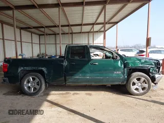 2015 Chevrolet Silverado 1500 LT with VIN 1GCRCREC6FZ161835, listed as a IAAI auction lot 41516896 with 206,305 mi miles. Bid and sale history available at carsss.com. Image 14.