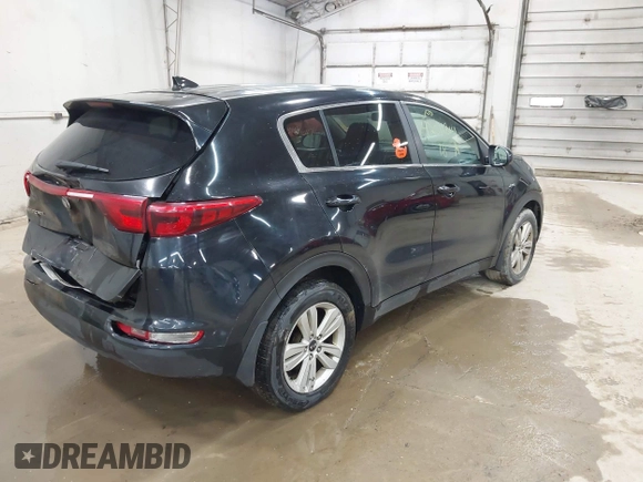 2018 Kia Sportage LX z VIN KNDPMCAC9J7351060, wystawiony jako IAAI lot #42011814 z przebiegiem 174 504 mil mil oraz . Historia ofert i sprzedaży dostępna na DreamBid. Obrazek 4.