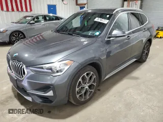 2021 BMW X1 xDrive28i with VIN WBXJG9C06M5S53321, listed as a Copart auction lot 57621945 with 49,668 mi miles and Clean title. Bid and sale history available at DreamBid. Image 1.