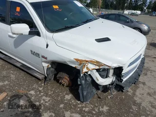2016 Ram 1500 Sport z VIN 1C6RR7HT1GS341479, wystawiony jako IAAI lot #41943001 z przebiegiem 127 115 mil mil oraz . Historia ofert i sprzedaży dostępna na DreamBid. Obrazek 6.