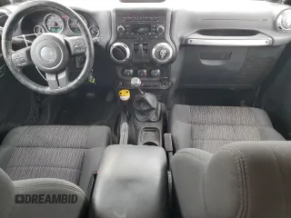 2011 Jeep Wrangler Rubicon with VIN 1J4BA6D15BL585388, listed as a Copart auction lot 76272184 with 119,043 mi miles and Clean title. Bid and sale history available at DreamBid. Image 8.