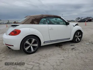 2013 Volkswagen Beetle with VIN 3VW7S7AT9DM816943, listed as a Copart auction lot 88466695 with 77,265 mi miles and Salvage Title. Bid and sale history available at DreamBid. Image 3.