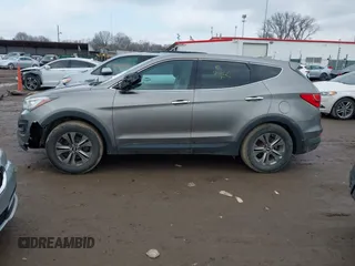 2016 Hyundai Santa Fe z VIN 5XYZTDLB1GG343763, wystawiony jako IAAI lot #41659641 z przebiegiem 96 415 mil mil oraz . Historia ofert i sprzedaży dostępna na DreamBid. Obrazek 14.