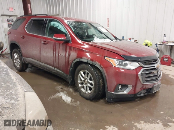 2021 Chevrolet Traverse LT Cloth with VIN 1GNEVGKW8MJ124350, listed as a IAAI auction lot 41456704 with 121,336 mi miles. Bid and sale history available at carsss.com. Image 1.