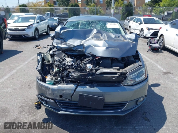 2013 Volkswagen Jetta Hybrid SE with VIN 3VW637AJ1DM232687, listed as a IAAI auction lot 41973407 with 70,428 mi miles and . Bid and sale history available at DreamBid. Image 12.