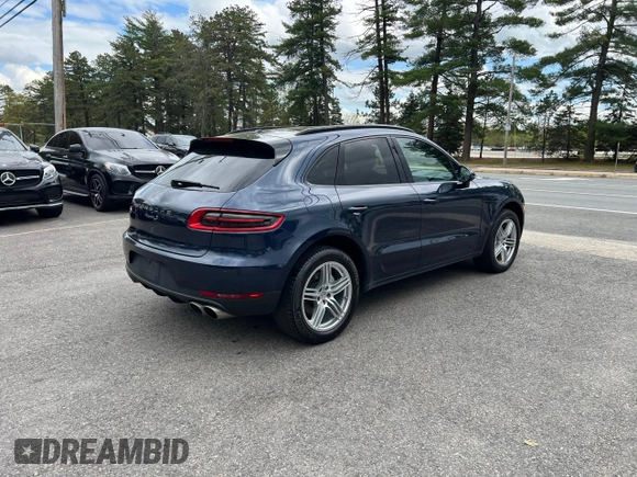 2015 Porsche Macan S with VIN WP1AB2A55FLB54214, listed as a Copart auction lot 56436285 with 157,439 mi miles and Clean Title. Bid and sale history available at DreamBid. Image 4.