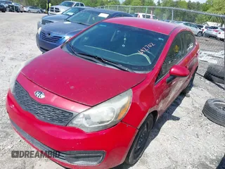 2015 Kia Rio LX with VIN KNADM4A33F6427021, listed as a IAAI auction lot 42011458 with 184,738 mi miles. Bid and sale history available at carsss.com. Image 2.