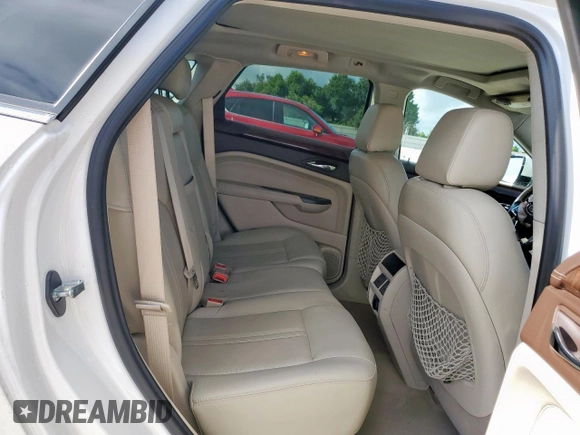 2014 Cadillac SRX Performance Collection with VIN 3GYFNCE39ES687733, listed as a Copart auction lot 62770665 with 151,714 mi miles and Salvage title. Bid and sale history available at DreamBid. Image 11.